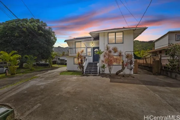 Enhanced:  Located at the base of the Ko'olau Mountains this North Shore home has the perfect island vibe.