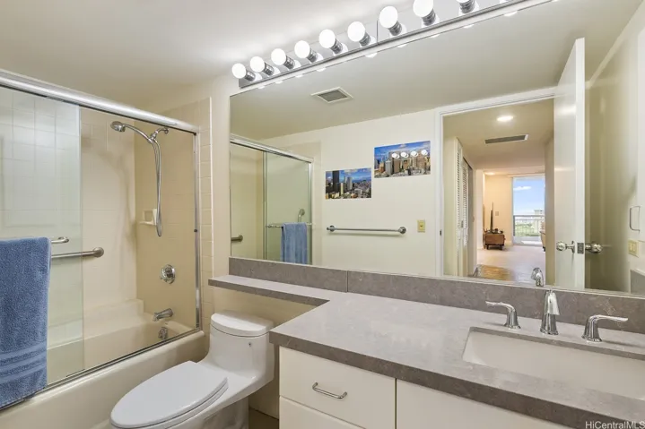 Large guest bath with upgraded granite counter and cabs.