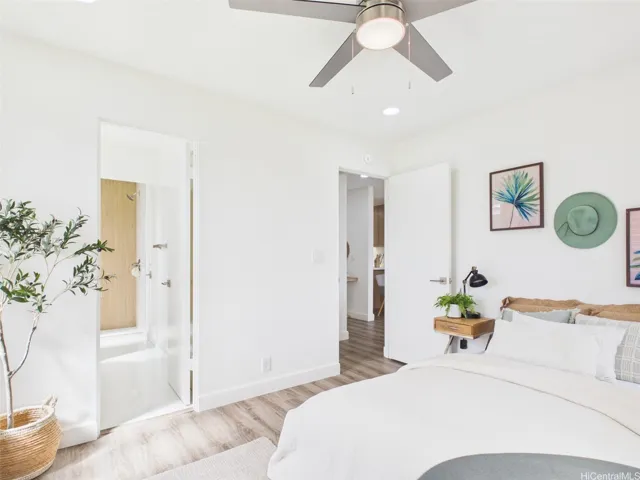 Bedroom connects directly to the renovated full bath