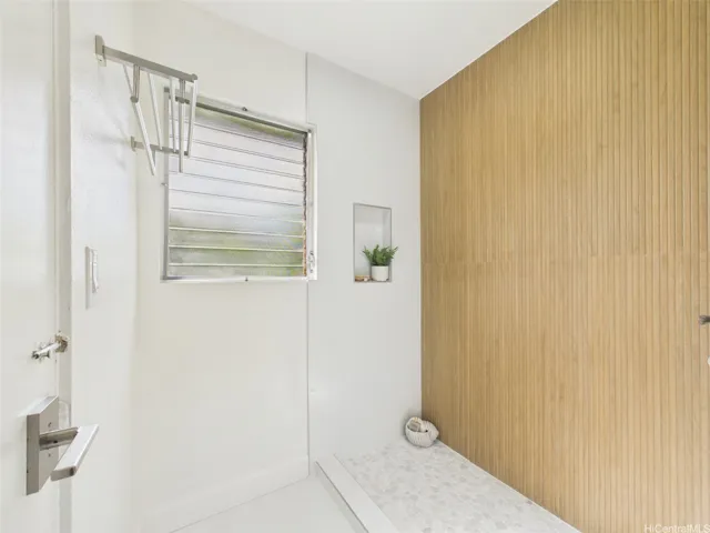 Separate wet room keeps the shower off the main bath
