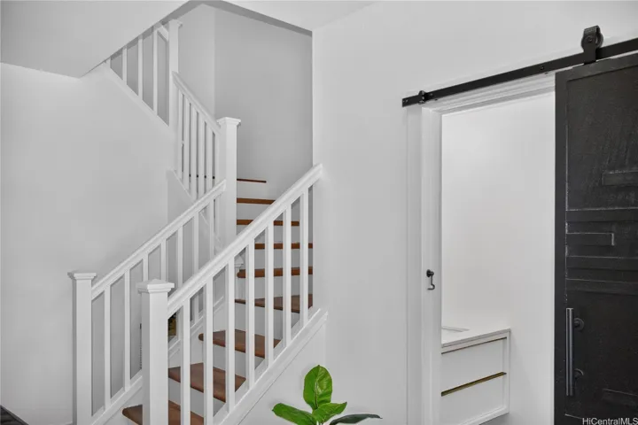 Stairway next to half bath