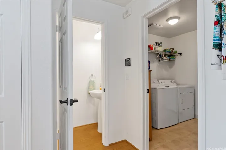 From the Kitchen going into laundry room on the right and a half a bath on the left side