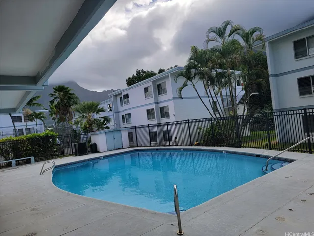 Enjoy a refreshing dip in the community’s fenced swimming pool, conveniently located next to the meeting and party room—perfect for relaxing, gathering with friends, or celebrating special occasions close to home.