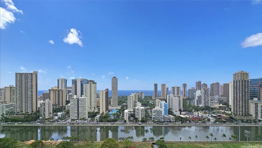 Relax and enjoy a picture-perfect view of the ocean, Ala Wai canal, DH, and Waikiki from your lanai.