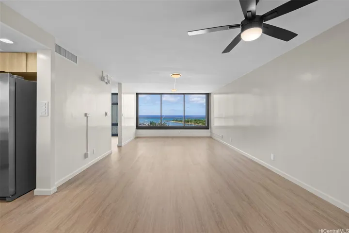 Spacious open-concept living area with an inviting, airy atmosphere.