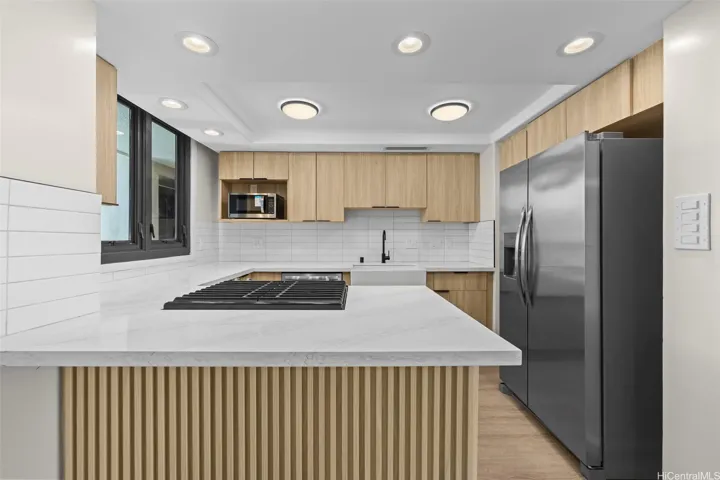 This space features an additional versatile seating area that can be utilized as a dining space.