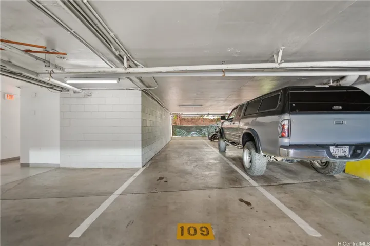 Tandem parking for 2 right next to the elevators