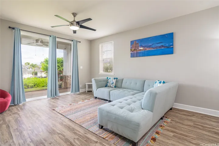 Living Room with Lighted Ceiling Fan