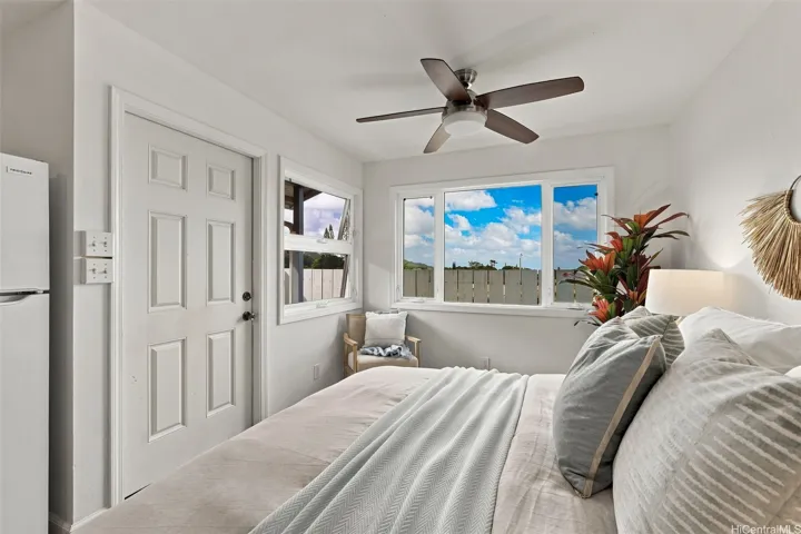 Fourth bedroom features a private separate entrance, perfect for a home office, multi-generational living, or rental potential.