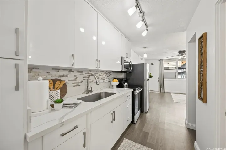 Kitchen with quartz countertops and upgraded cabinetry