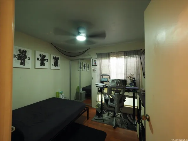 Second Bedroom is cool, clean, and quiet with mirrored Closet doors, Ceiling Fan, and ample natural light.