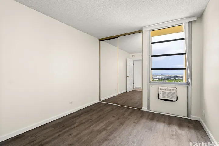 First bedroom with window AC.