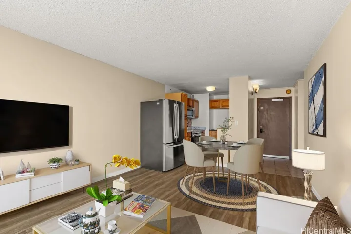 Large living room. Virtually staged. Kitchen on the back left and unit door on the back right of the photo.