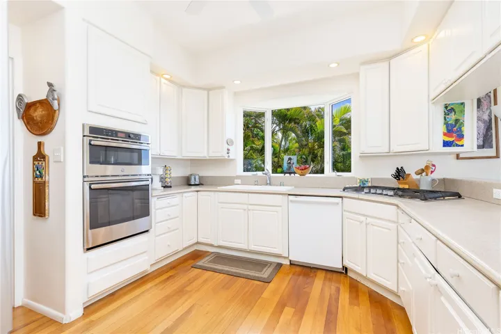 Spacious, open chef’s kitchen flows seamlessly into an additional dining and living area, offering the perfect space for everyday living and effortless entertaining.