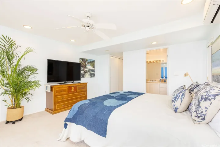 Second bedroom complete with a private ensuite bath for added comfort and convenience.
