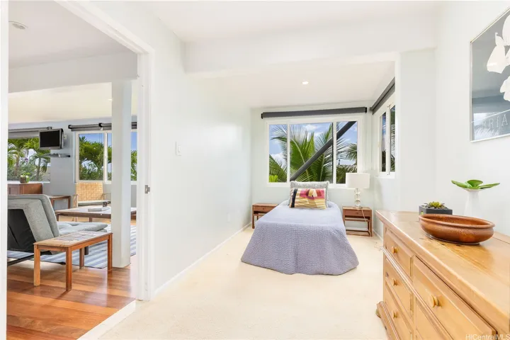 Versatile additional room off the lower-level living area, ideal as a home office, multipurpose space, or cozy bedroom.