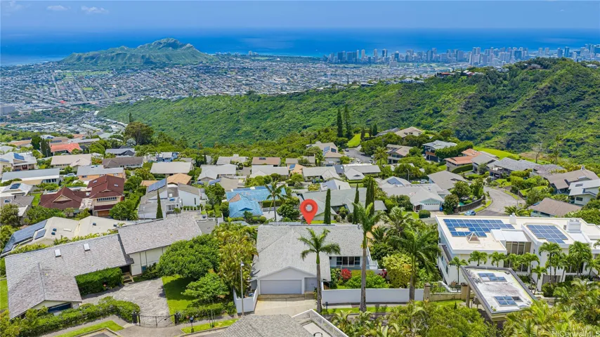 Ideally located in town, perched atop Waialae Nui Ridge, offering a peaceful retreat with convenient access to Honolulu’s best amenities.