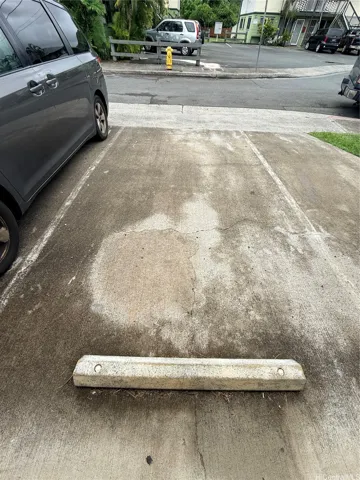 Two (2) open parking stalls comes w/Apt. "A"