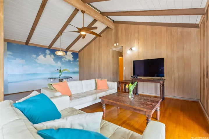 High vaulted ceilings and natural redwood walls