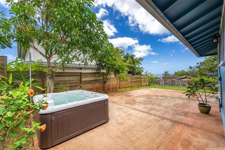 Beautifully landscaped w/flowers, mango, & citrus