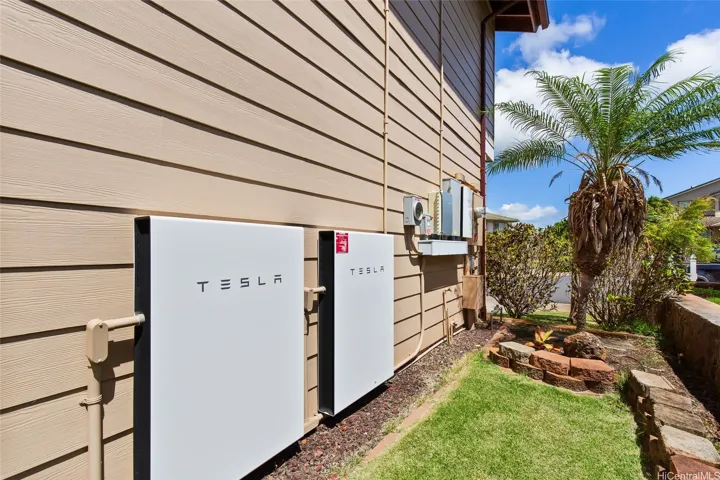 22 paid PV panels & 2 Tesla Batteries