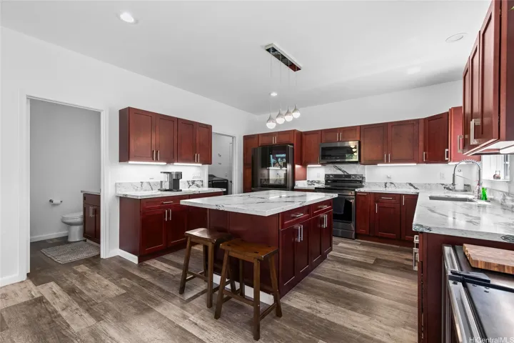 Spacious open plan living, dining & kitchen with lots of natural light
