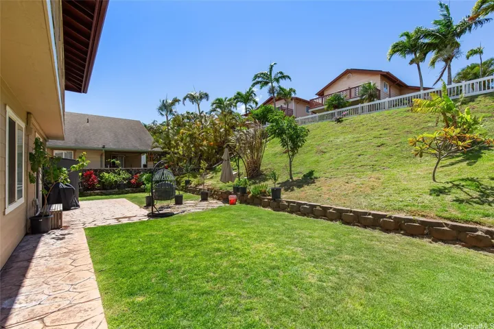 2 story home in Makakilo Highpoint in a cul de sace, with a very spacious driveway, 2 car garage & a landscaped fenced in backyard