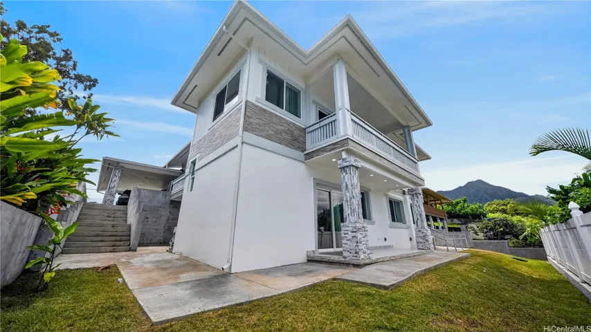 Stucco finish, concrete washed eaves.