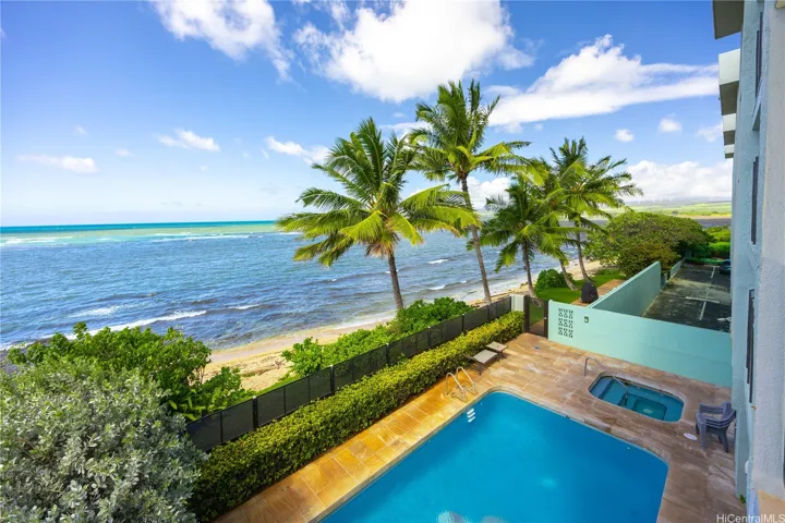 View of the swimming pool and jacuzzi from unit #301.