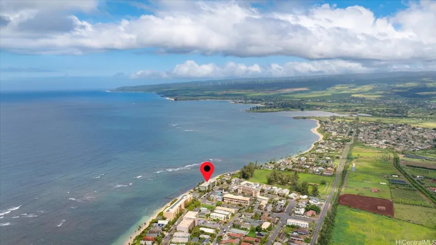 Ariel view looking down the coast towards Sunset Beach.
