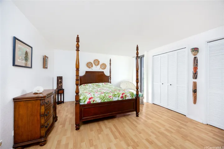 Main bedroom features lots of closet space and natural light.