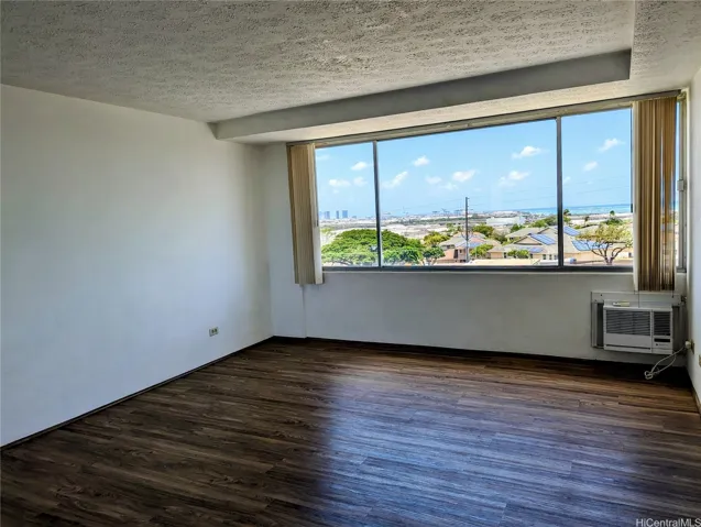 Studio has newer luxury Vinyl plank flooring, window AC and ocean views
