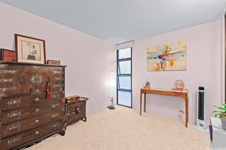 Second bedroom with upgraded safety windows