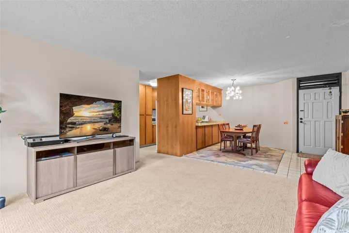 Inviting living area with open flow to dining and kitchen