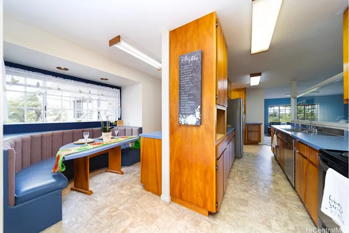 Large galley kitchen with back storage