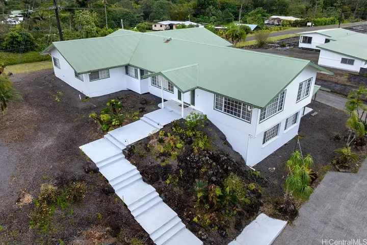 Elegant front home that sit high so you have views and cool breezes