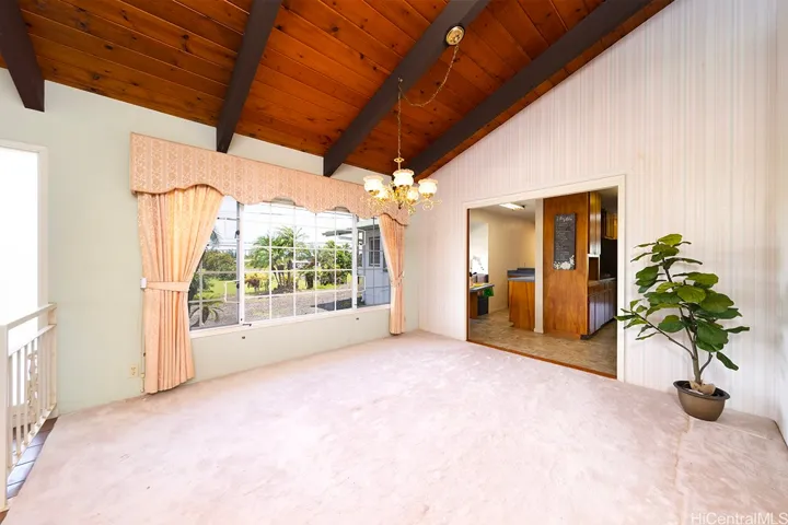 Formal dining room. Pocket double doors allow you to go into the kitchen