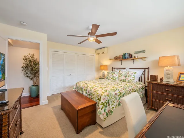 This spacious bedroom offers comfort, privacy, and convenience with its own ensuite bathroom. Thoughtfully designed with plush carpeting, neutral tones, and ample natural light, the room creates a warm and relaxing retreat. Features include split-system air conditioning, a ceiling fan for year-round comfort, and generous closet space for storage. The well-proportioned layout easily accommodates a variety of furniture arrangements, while direct access to the private ensuite bath adds everyday convenience and functionality. Ideal for family members or guests, this inviting bedroom provides a peaceful sanctuary within the home.