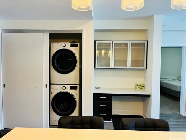 full size washer and dryer and desk area