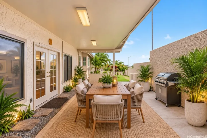Virtually staged spacious covered lanai showcasing the potential for outdoor dining, lounging, and entertaining while enjoying Hawaii’s indoor-outdoor lifestyle.