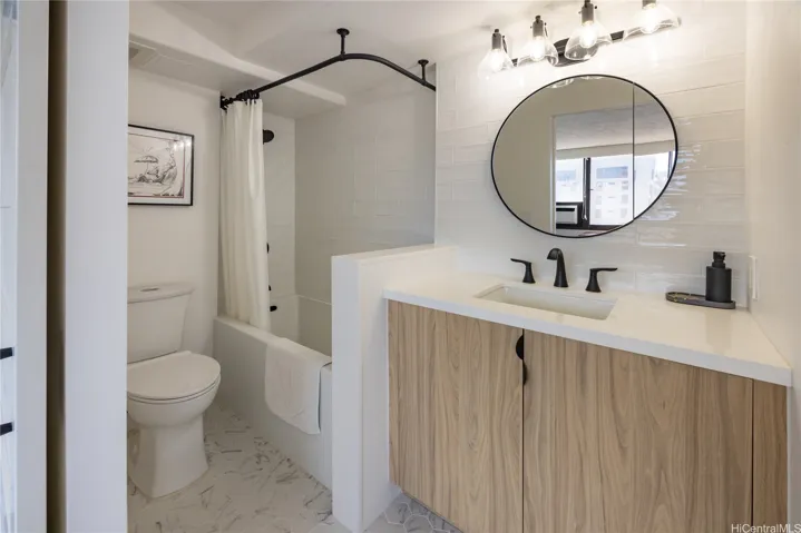 second bathroom with deep soaking tub, glossy textured subway 4x8 tiles create a masterpiece.