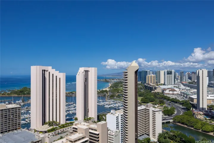 Elegant building exterior with secure entry and resort-style amenities.