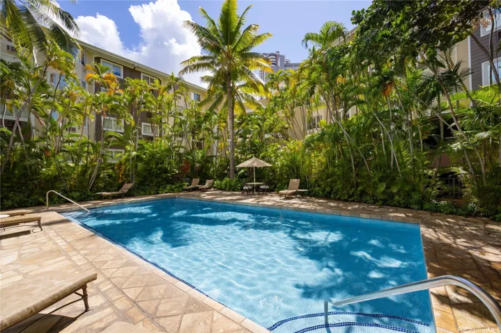 Pool on the mezzanine level with gym and private entertaining areas and rest rooms