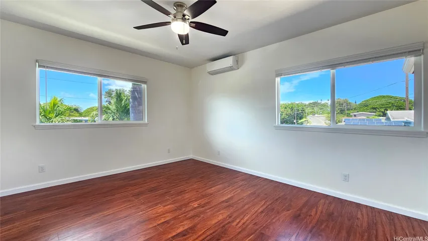 Upstairs bedroom with a nice garden views