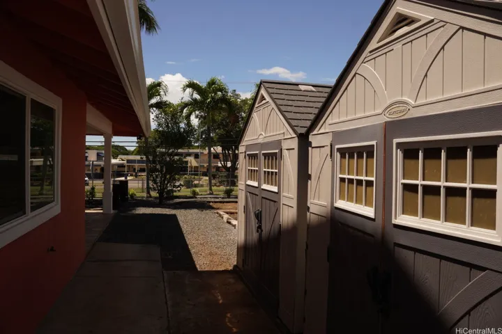 Storage: Two (8' x 9') storage sheds on 4-inch concrete slabs, designed with drainage to direct water away from the sheds.