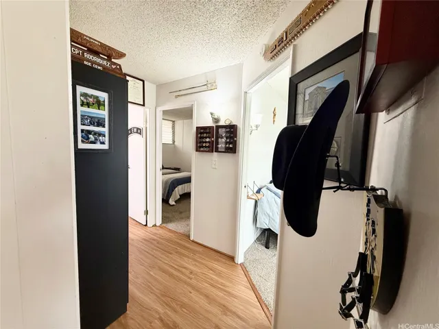 Hallway to bedrooms and bathroom