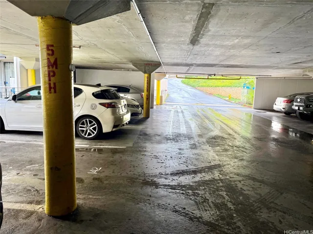 Parking stall 3 spots down from elevator
