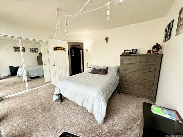 Bedroom 1 on the front of the building with AC
