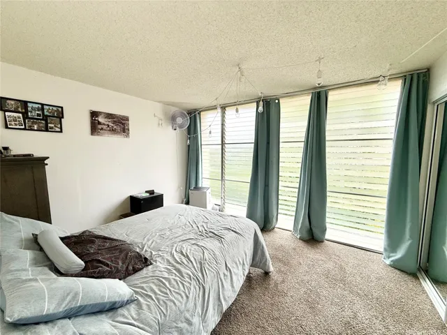 Bedroom 1 on the front of the building with AC