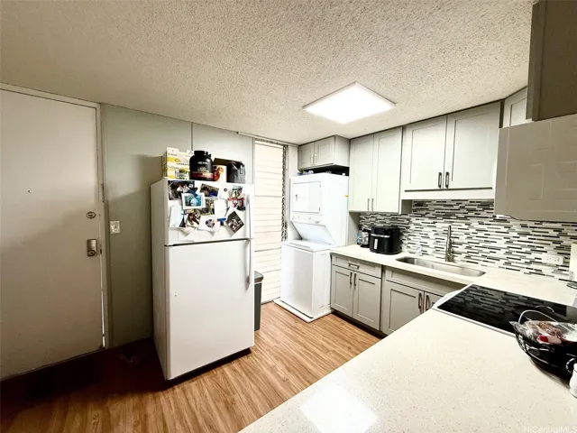 Open concept living/kitchen with lanai